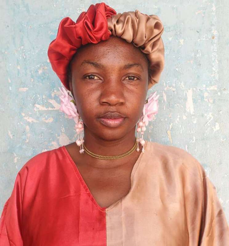 SIMON QUEENCY ADAEZE